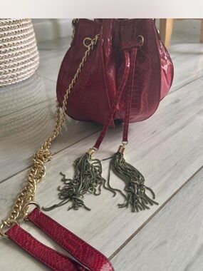 Cache Red Textured Drawstring Mini Bag with Gold Chain